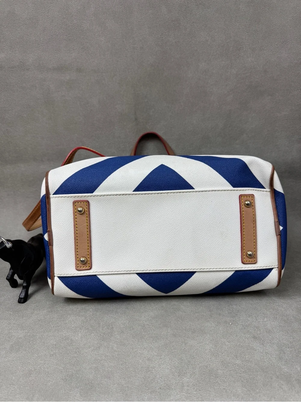Dooney & Bourke Blue and White Chevron Duffel with Brown Leather Trim